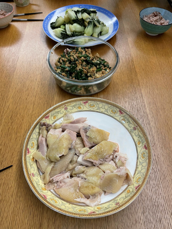 Linda works on her cooking skills with the help of some YouTube tuitions.