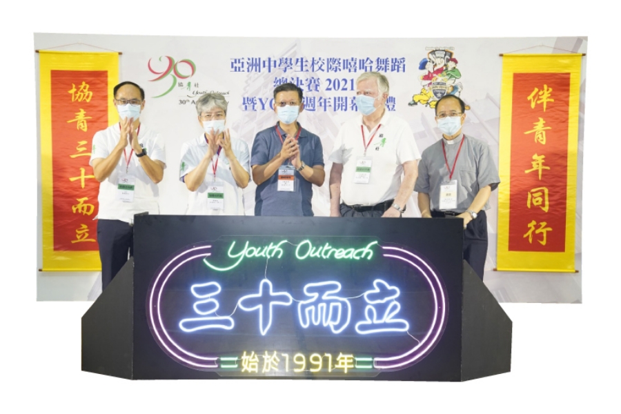 Wan Man-yee (second left) is committed to youth development and set up a youth organisation, offering them support and putting on cultural events to develop their talents.