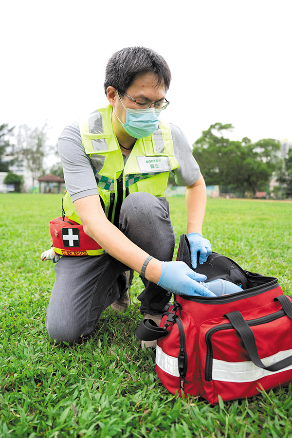 Dr Chau with the medical bag he carries while working on the sidelines of sporting events as a MDD.