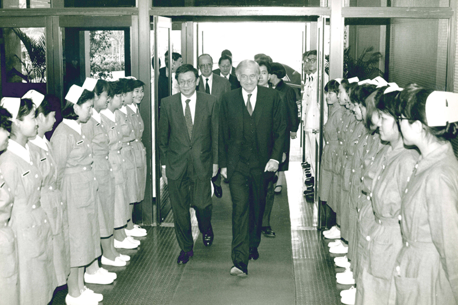 The then Governor Sir David Wilson officiated at the opening ceremony of TMH. 