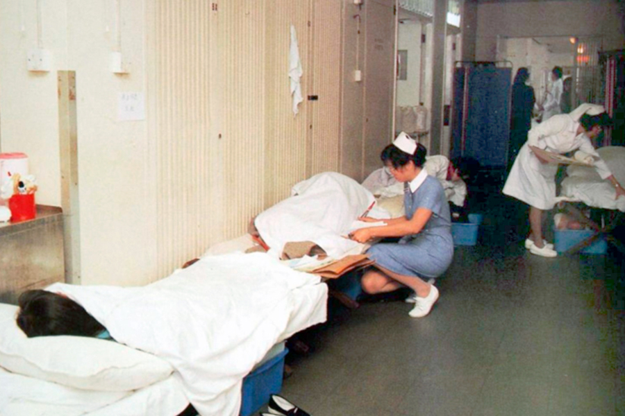 The wards of QEH were filled with canvas beds in its early days.