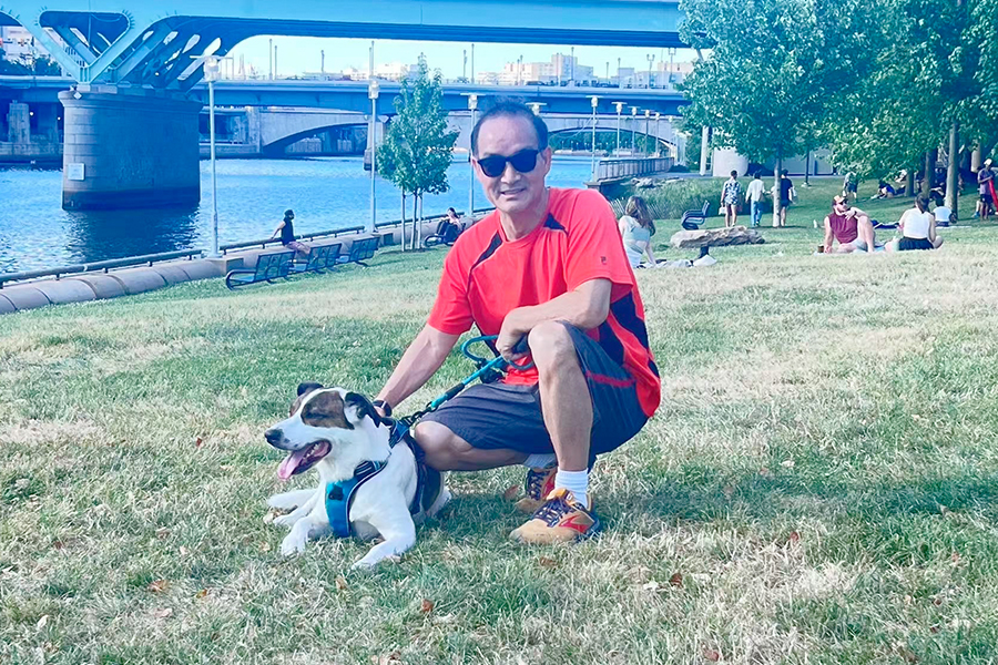 Professor Zhang takes his beloved pet dog Lucy for running.