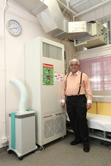 Dr Daniel Chu, Chief of Service and Cluster Service Coordinator (Family Medicine and Primary Healthcare), HKEC, introduces the high-efficiency particulate air (HEPA) filter equipped in Shau Kei Wan Jockey Club General Out-patient Clinic. To safeguard the health of people indoors and outdoors, exhaust air from the clinic will be filtered by a HEPA filter system, which can change the indoor air at least four times per hour.