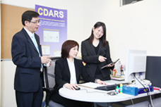 The team’s leader, Dr Lee Yuen-lun (left),and two of its core members, Marita Cheng (centre) and Dr Anna Tong discuss ways to optimise the ability of the CDARS to meet the needs of frontline healthcare colleagues.