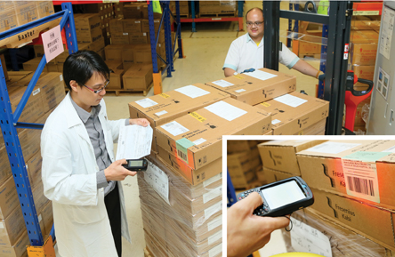 Colleagues scan on the barcode to confirm the right drugs in the right batches.