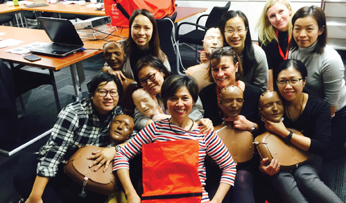Nurse Chim (centre, front row) visited the UK last year and was impressed by the level and quality of community nursing services. She is now considering whether any of the positive practices she witnessed could be adapted for use in Hong Kong.