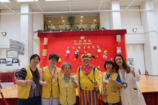 Volunteers of the Shatin Hospital bringing joy to patients wearing various costumes