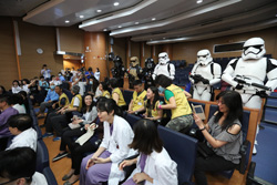 Stormtroopers and Darth Vader wow the audience at the performance